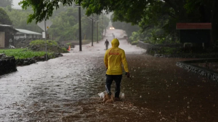 Storm clouds over Hawaii as residents recover from repeated hurricanes and flooding